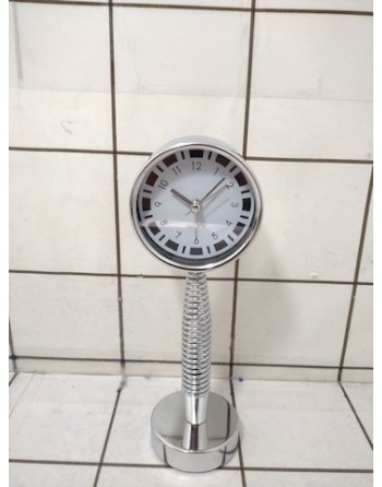 RELOJ CON PIE RESORTE...